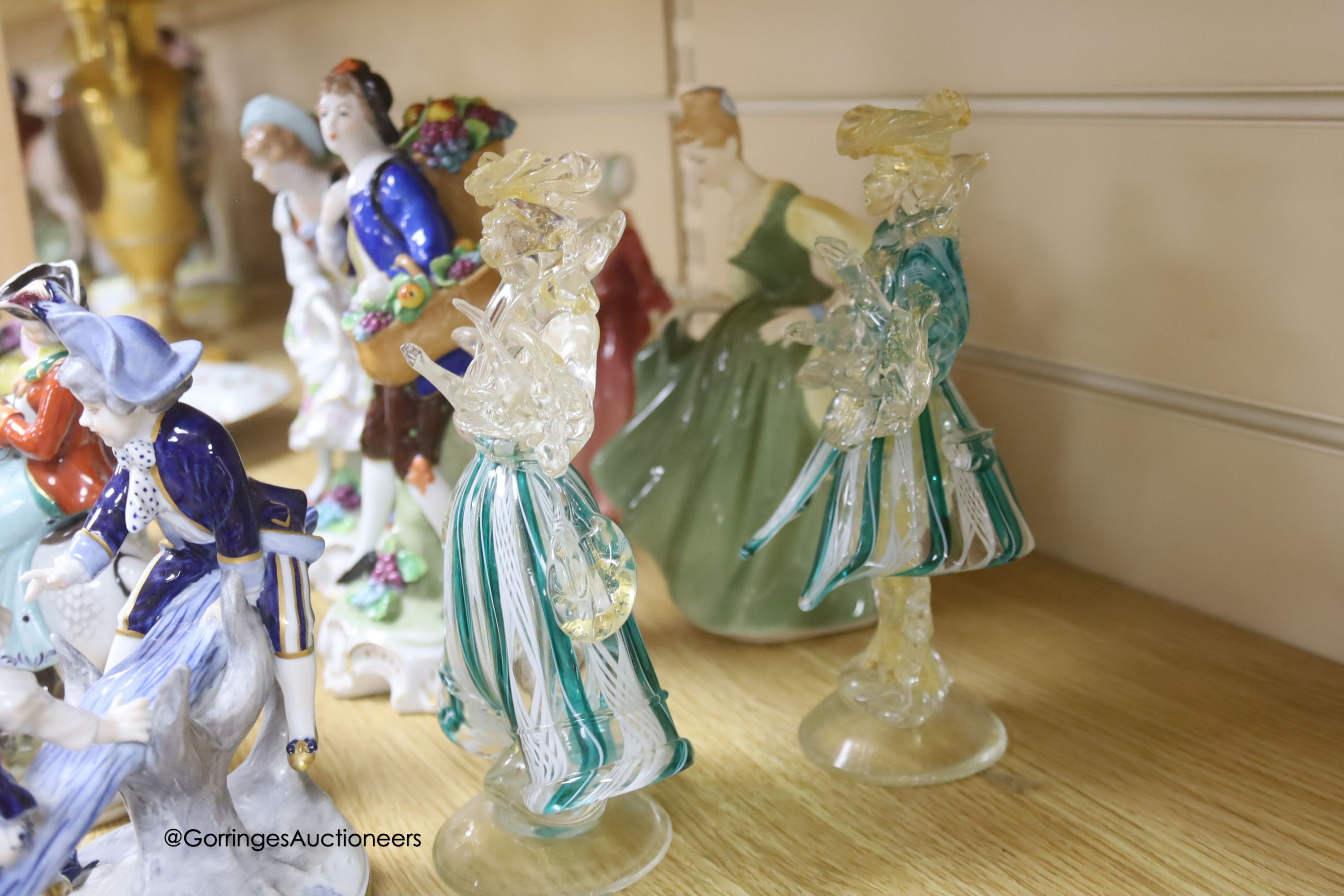 A collection of 20th century Sitzendorf, Dresden and Doulton porcelain figures, tallest 21cm and a pair of Murano glass figures